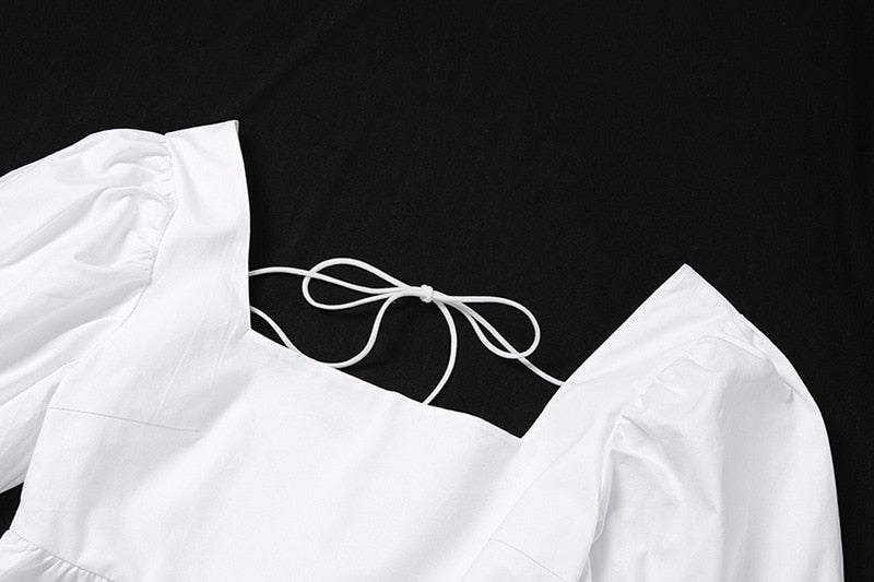 Anything But A White Mini Dress