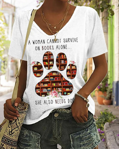 A Woman Cannot Survive On Books Alone - She Also Needs Dogs T-Shirt